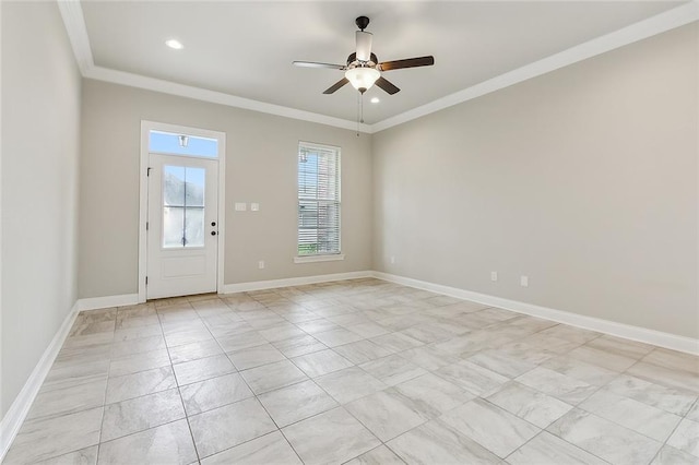 empty room featuring crown molding and ceiling fan