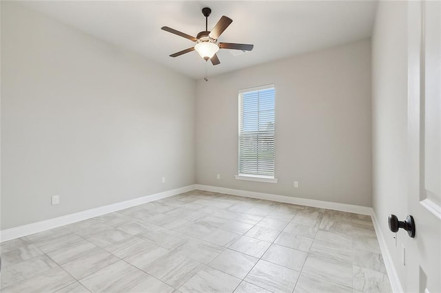 empty room featuring ceiling fan