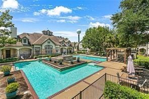 view of swimming pool with a patio