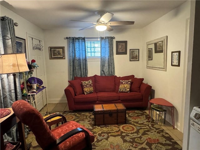 tiled living room featuring ceiling fan