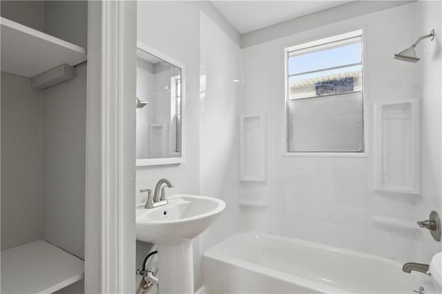 bathroom featuring sink and bathtub / shower combination