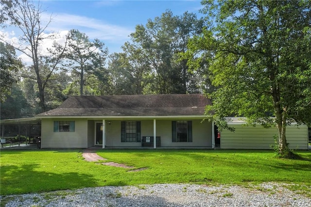 single story home featuring a front yard and a porch