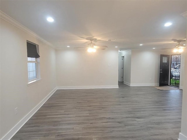 4985 Feliciana Dr, New Orleans, LA 70126 - spare room with a ceiling fan, healthy amount of natural light, recessed lighting, crown molding, and baseboards