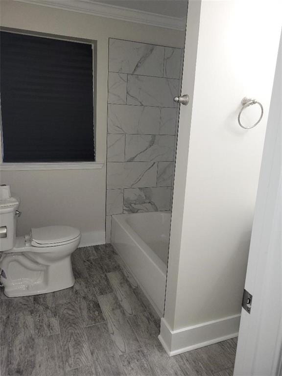 4985 Feliciana Dr, New Orleans, LA 70126 - bathroom with toilet, crown molding, and wood finished floors