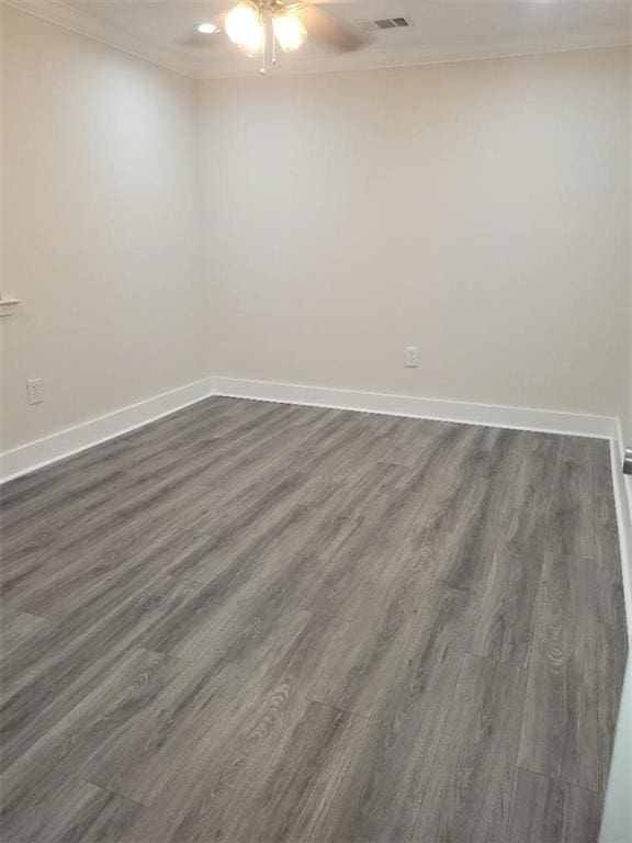 4985 Feliciana Dr, New Orleans, LA 70126 - empty room with crown molding, ceiling fan, dark wood-style flooring, baseboards, and recessed lighting
