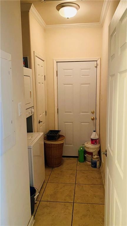 entryway with electric panel, ornamental molding, and light tile patterned floors