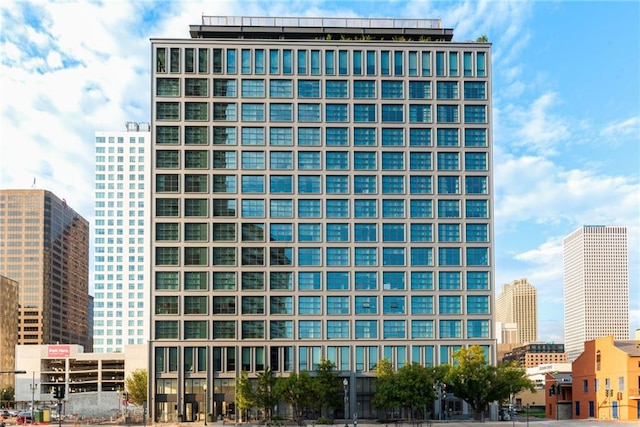 view of building exterior featuring a city view