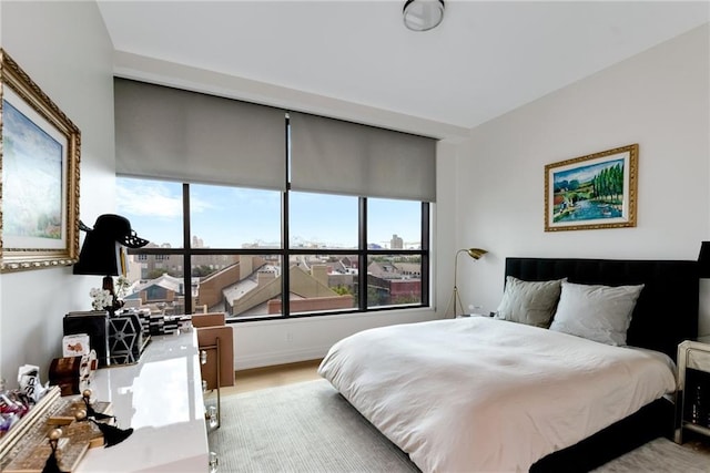 bedroom featuring light wood-type flooring