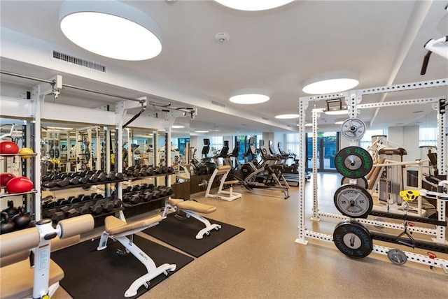 gym featuring visible vents