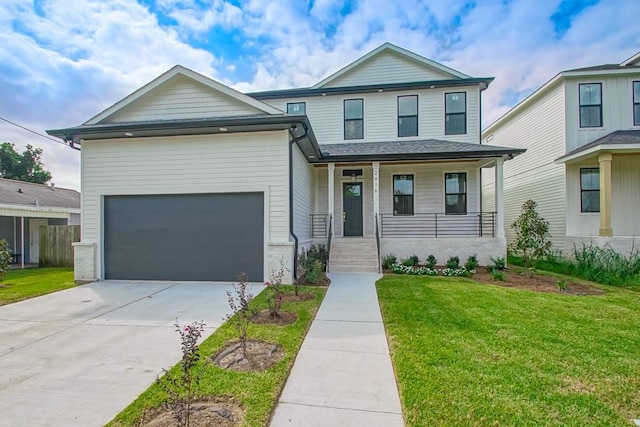 view of front of home featuring a front yard, a porch, and a garage