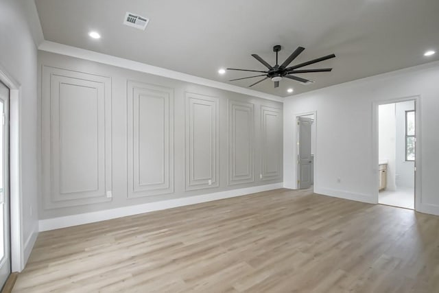 interior space featuring light hardwood / wood-style flooring, ceiling fan, and ornamental molding