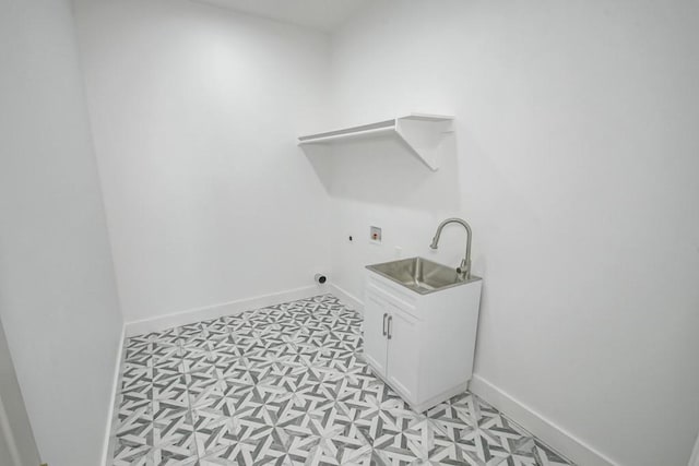 laundry room featuring cabinets, hookup for an electric dryer, washer hookup, and sink