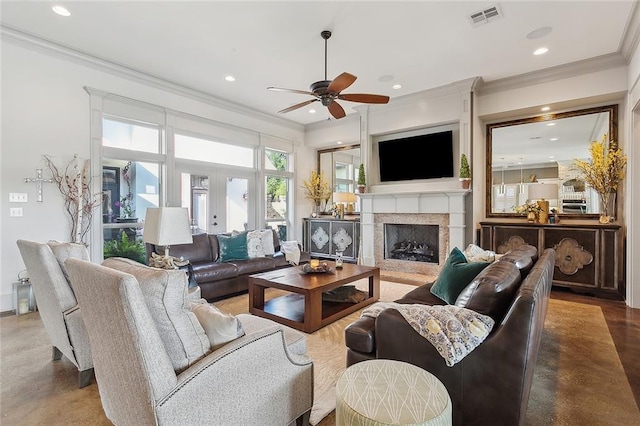 living room featuring ceiling fan, french doors, and crown molding