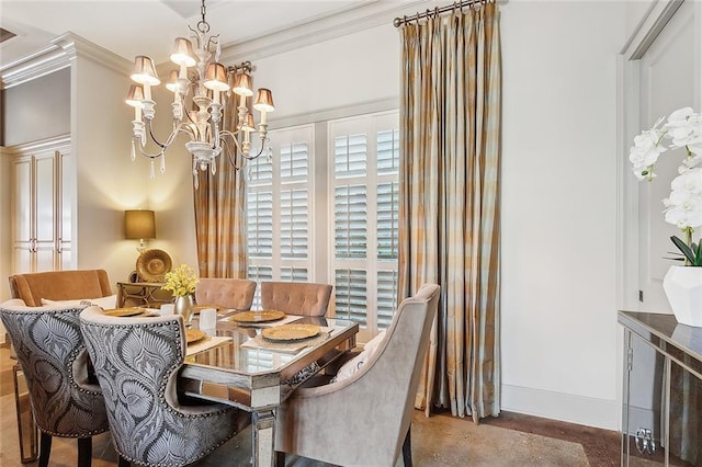 dining space with an inviting chandelier and ornamental molding