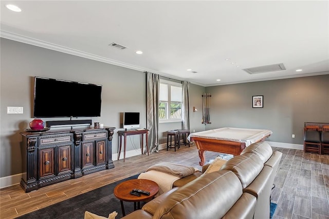 living room featuring pool table, light hardwood / wood-style floors, and ornamental molding