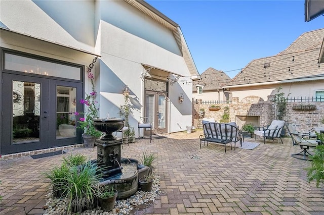 view of patio / terrace featuring french doors