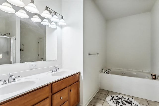 bathroom featuring vanity, plus walk in shower, and tile patterned floors