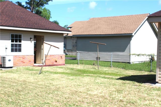 view of yard featuring central AC