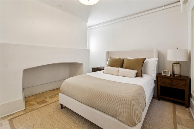 600 Esplanade Ave Unit 1, New Orleans, LA 70116 - bedroom featuring stone finish floor