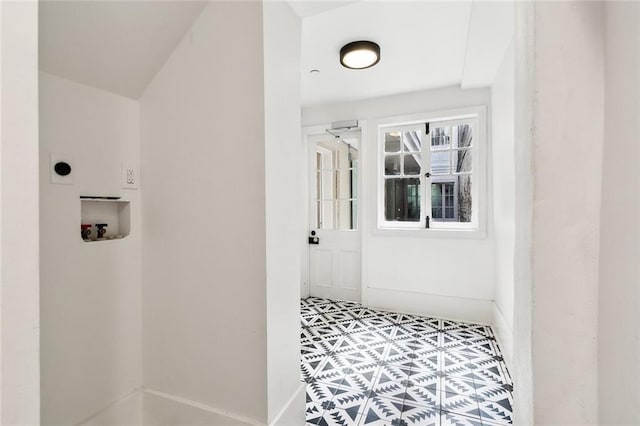 interior space with tile patterned floors