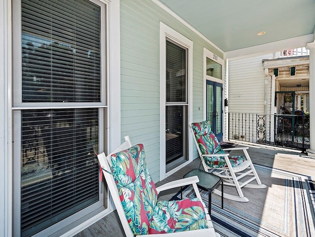 wooden terrace featuring a porch