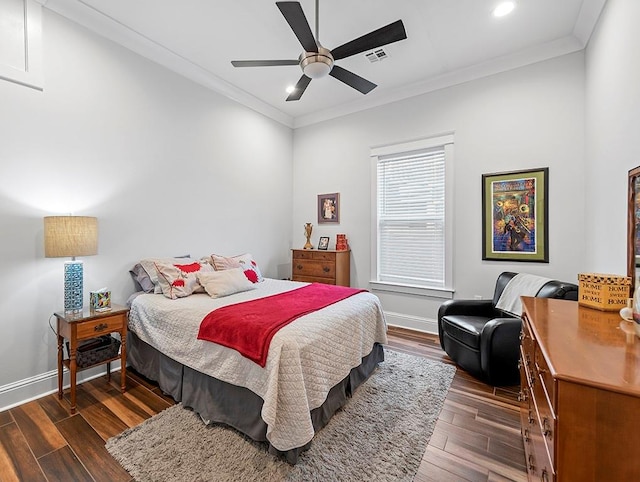 bedroom featuring crown molding, dark hardwood / wood-style flooring, and ceiling fan