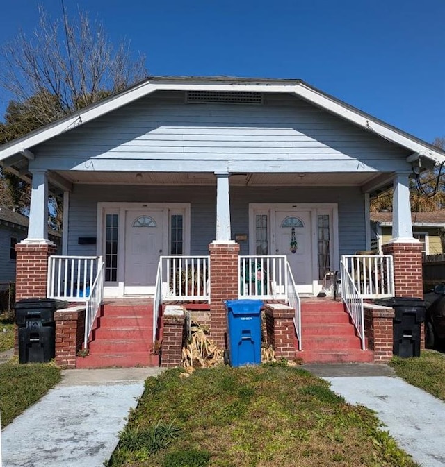 bungalow-style home with a porch