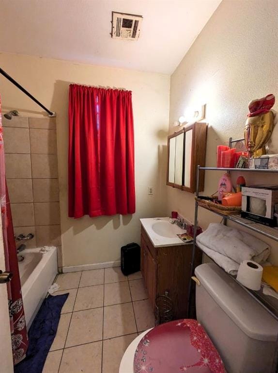 full bathroom with tile patterned flooring, vanity, shower / bath combo, and toilet