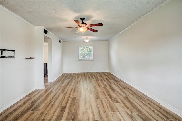 unfurnished living room featuring a textured ceiling, ceiling fan, and light hardwood / wood-style flooring