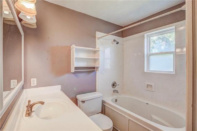 full bathroom featuring vanity, tub / shower combination, and toilet