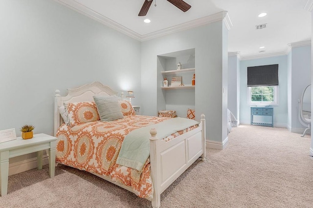 bedroom featuring crown molding, light colored carpet, and ceiling fan