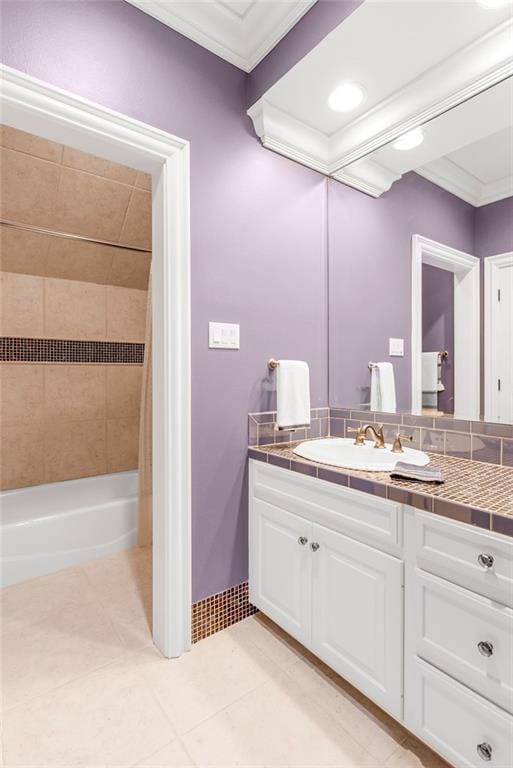 bathroom with crown molding, shower / tub combo, tile patterned floors, and vanity