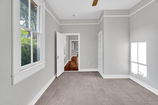 unfurnished room featuring ceiling fan and light hardwood / wood-style floors