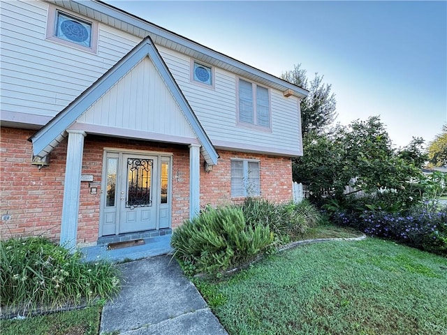 exterior space featuring a front lawn