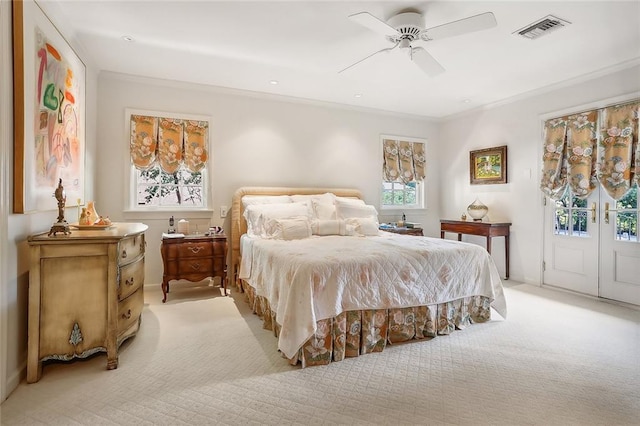 bedroom with ceiling fan, light colored carpet, access to outside, and crown molding