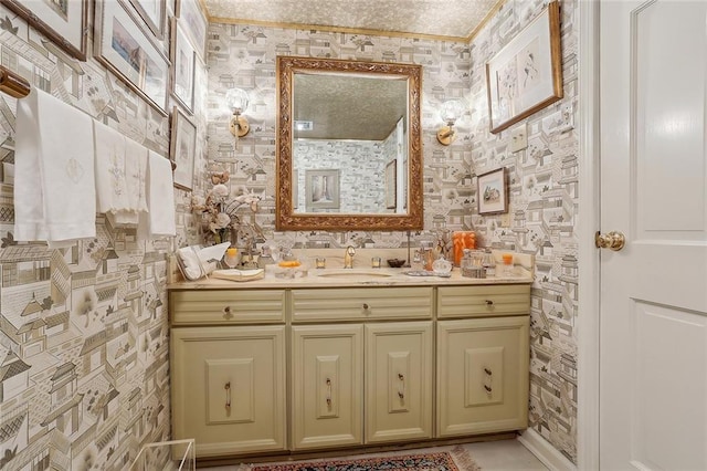 bathroom featuring vanity and crown molding