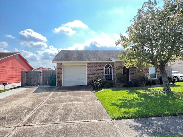 single story home with a garage and a front lawn