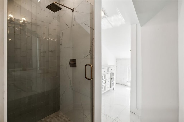 bathroom featuring an enclosed shower