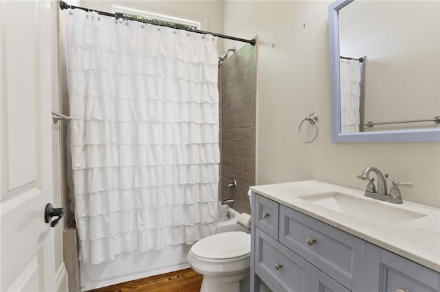 full bathroom featuring shower / tub combo, vanity, toilet, and wood-type flooring