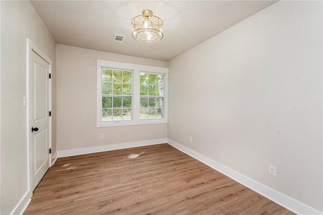 empty room featuring light hardwood / wood-style flooring