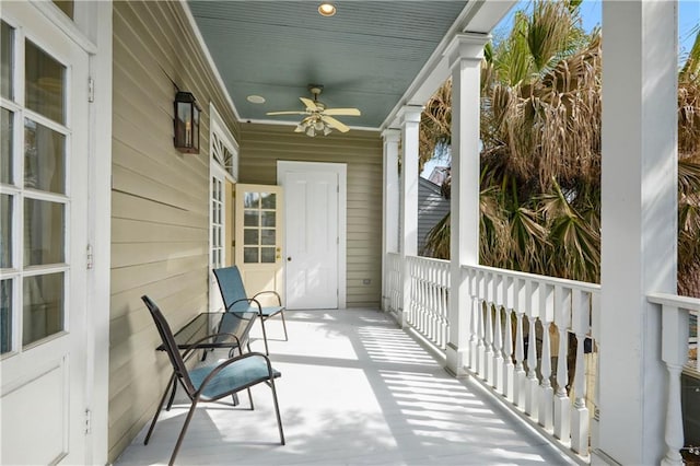 balcony featuring ceiling fan and covered porch