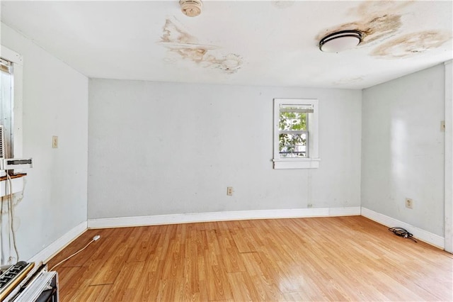 empty room with light wood-type flooring