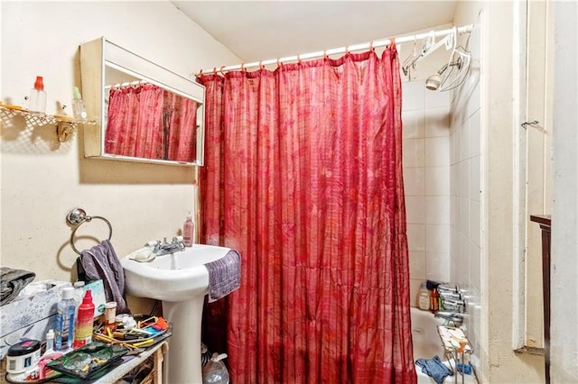 bathroom with a shower with shower curtain