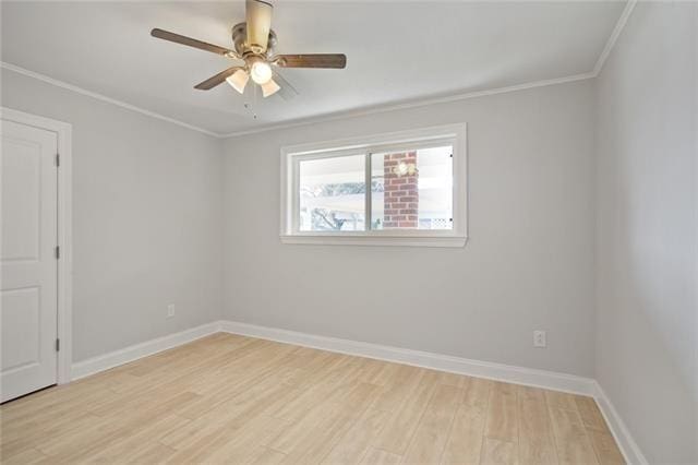 empty room with light hardwood / wood-style floors, ceiling fan, and crown molding