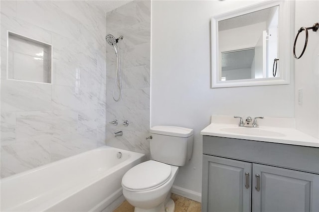 full bathroom with tiled shower / bath combo, vanity, and toilet