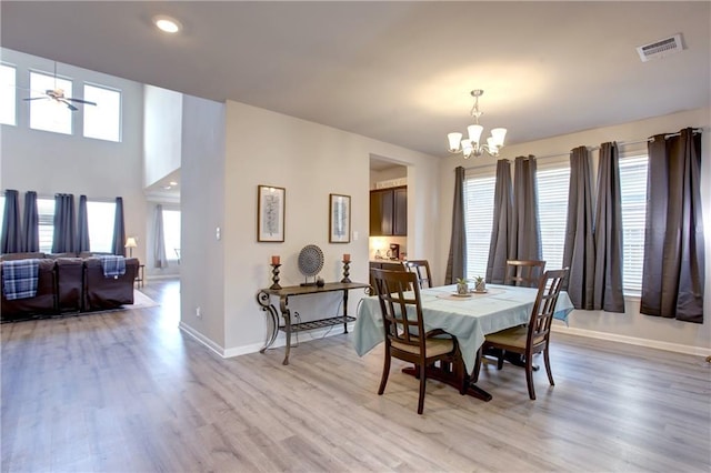 5572 Wake Reserve Rd, Slidell, LA 70461 - dining space featuring baseboards, a chandelier, light wood-type flooring, and recessed lighting