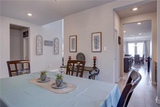 5572 Wake Reserve Rd, Slidell, LA 70461 - dining room with recessed lighting, light wood-type flooring, and baseboards