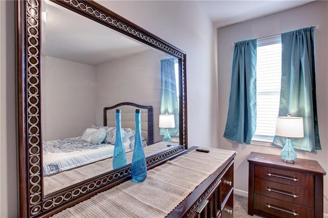 5572 Wake Reserve Rd, Slidell, LA 70461 - bedroom featuring carpet and baseboards