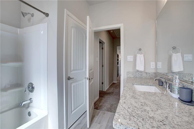 5572 Wake Reserve Rd, Slidell, LA 70461 - full bathroom with bathtub / shower combination, wood finished floors, and vanity