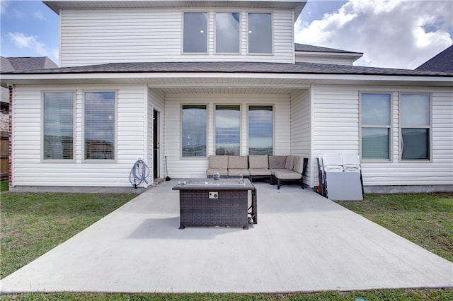 5572 Wake Reserve Rd, Slidell, LA 70461 - back of house featuring an outdoor living space, a patio, and a lawn